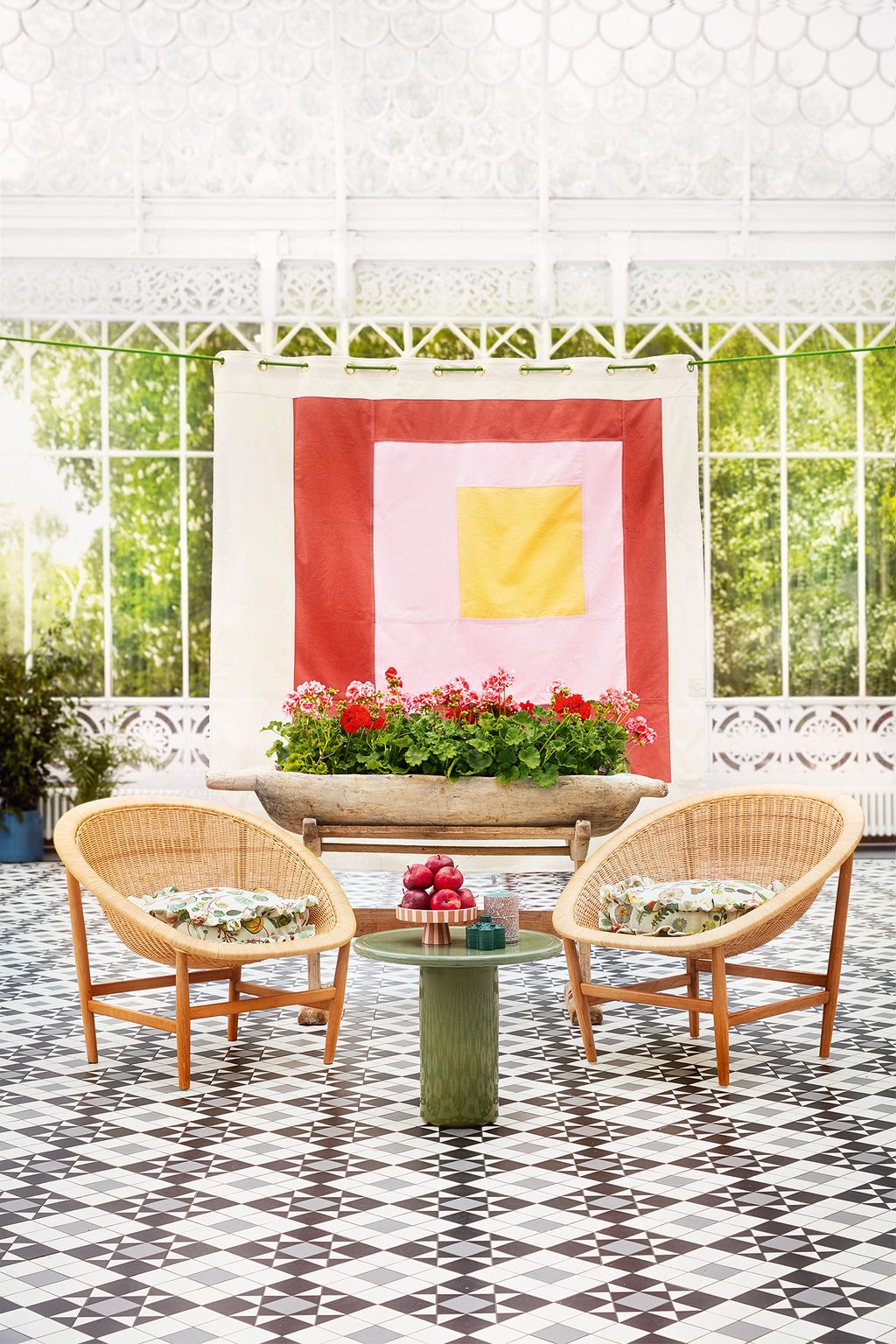 Image may contain Furniture Rug Lobby Indoors Room Plant Path Walkway and Table