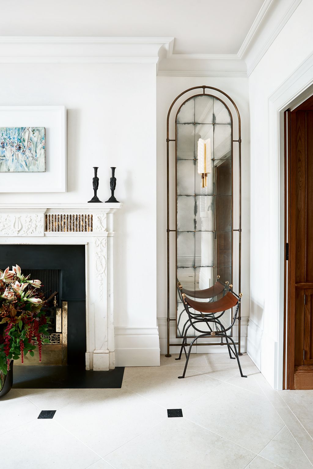 Image may contain Interior Design Indoors Home Decor Furniture Living Room Room Fireplace and Chair