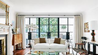 Image may contain Furniture Table Coffee Table Living Room Room Indoors and Rug