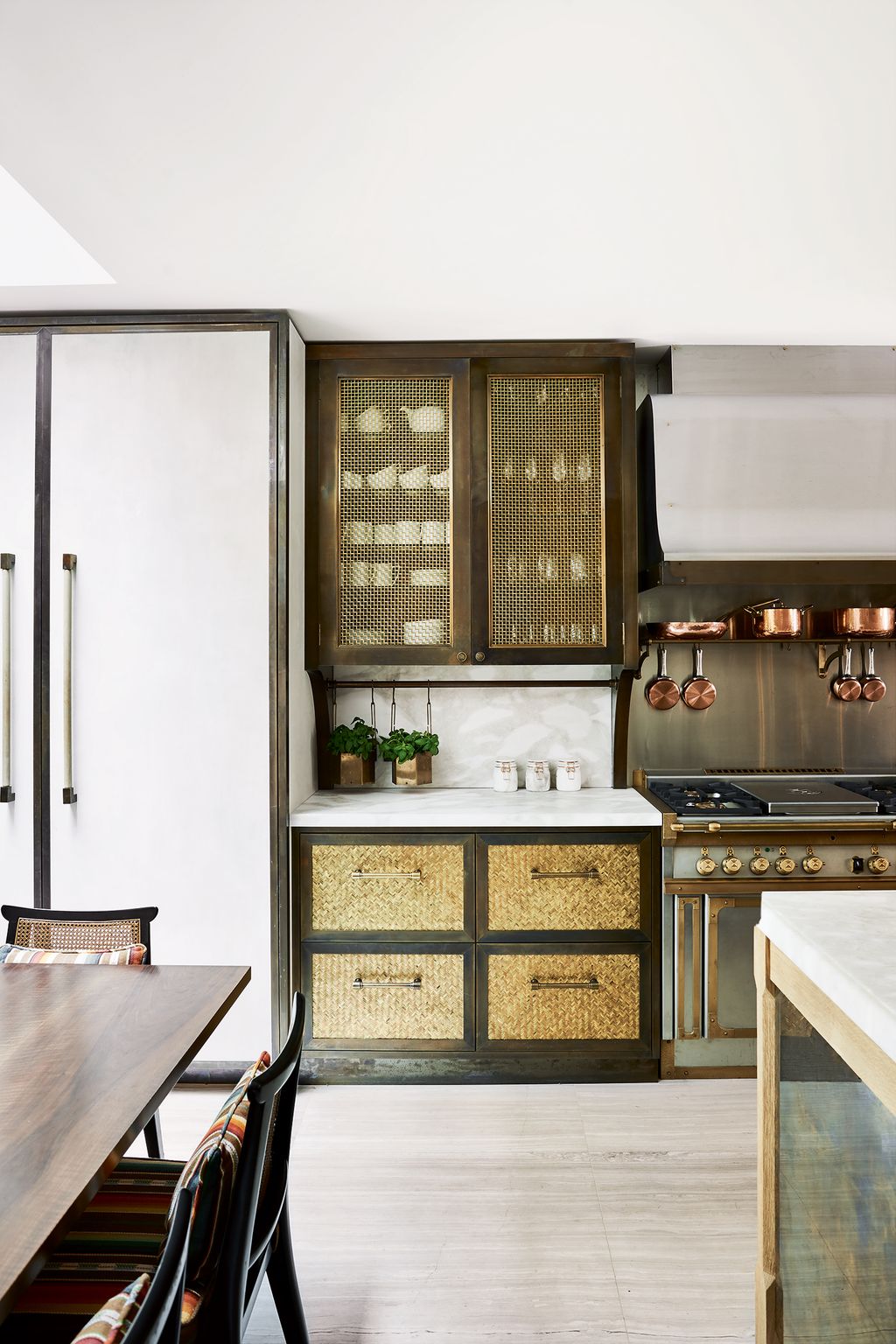 Image may contain Furniture Room Indoors Kitchen Chair Shelf Interior Design and Wood