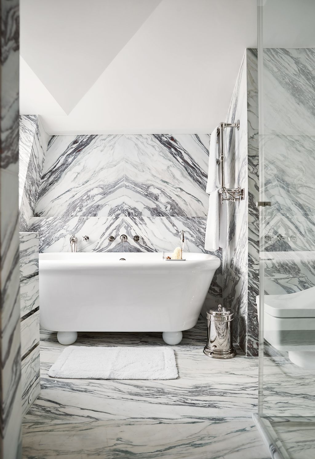 Image may contain Tub Bathtub Building Housing Indoors Interior Design Room Loft Attic and Bathroom