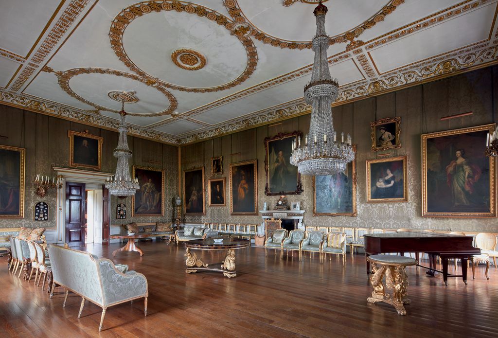 Image may contain Flooring Floor Hardwood Wood Furniture Room Indoors Interior Design and Chair