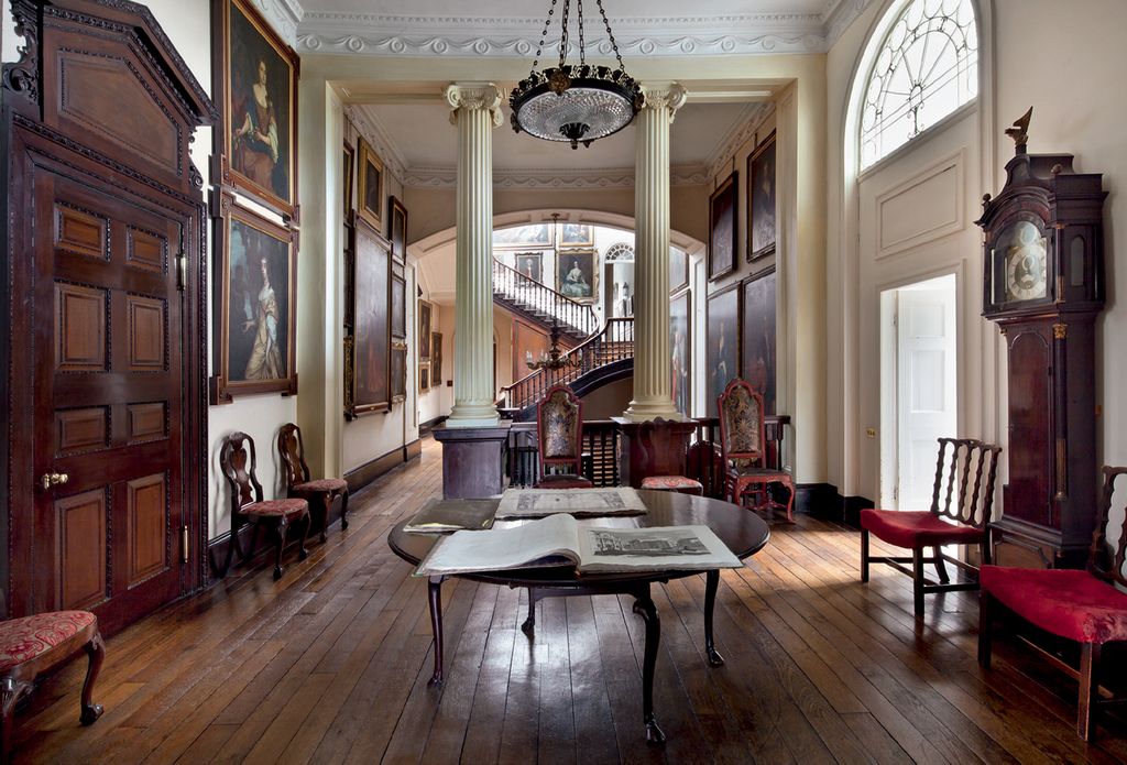 Image may contain Flooring Wood Hardwood Floor Interior Design Indoors Living Room Room Furniture and Couch