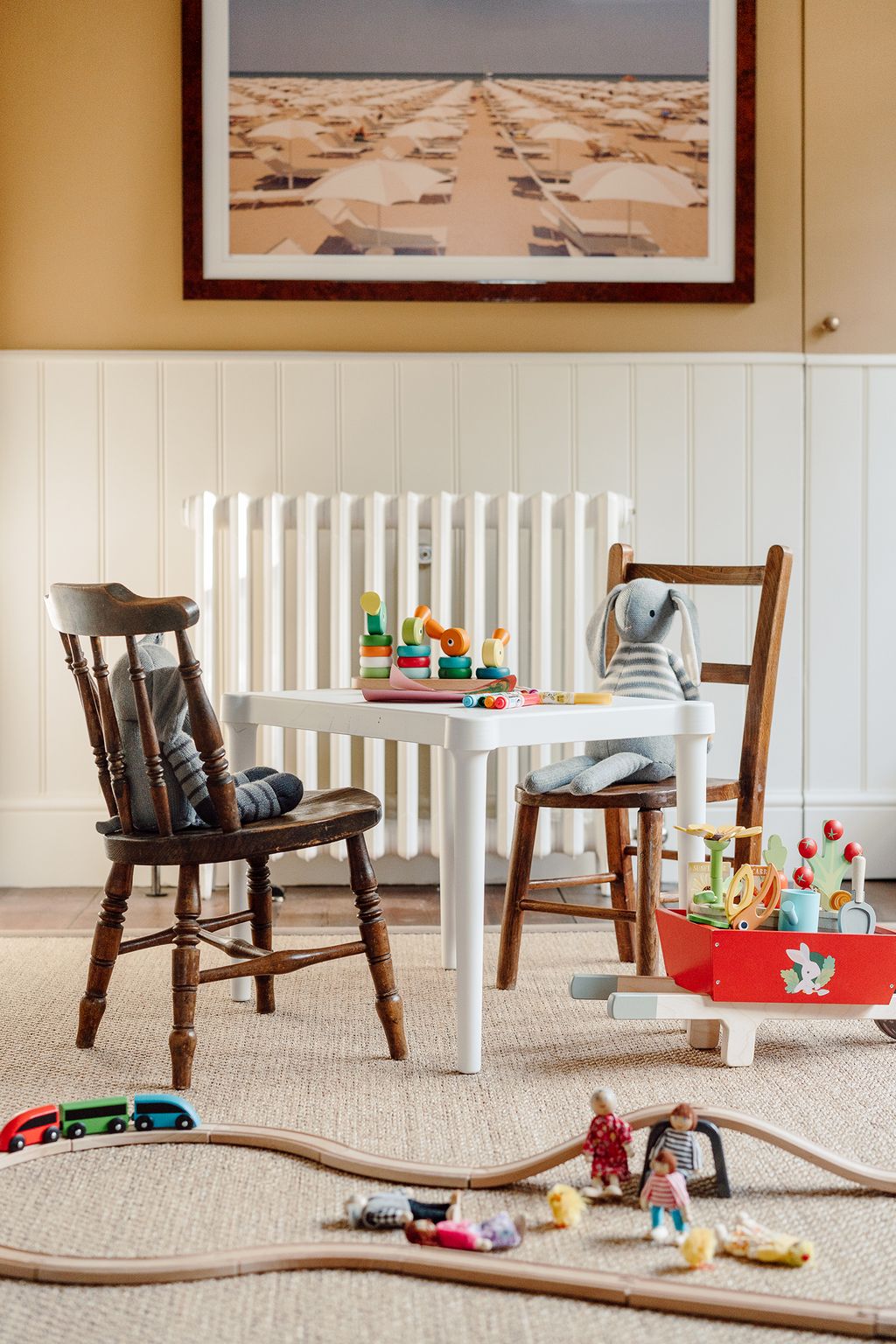 The playroom being situated here allows Louise and her husband to keep an eye on their daughter as they cook. The space...