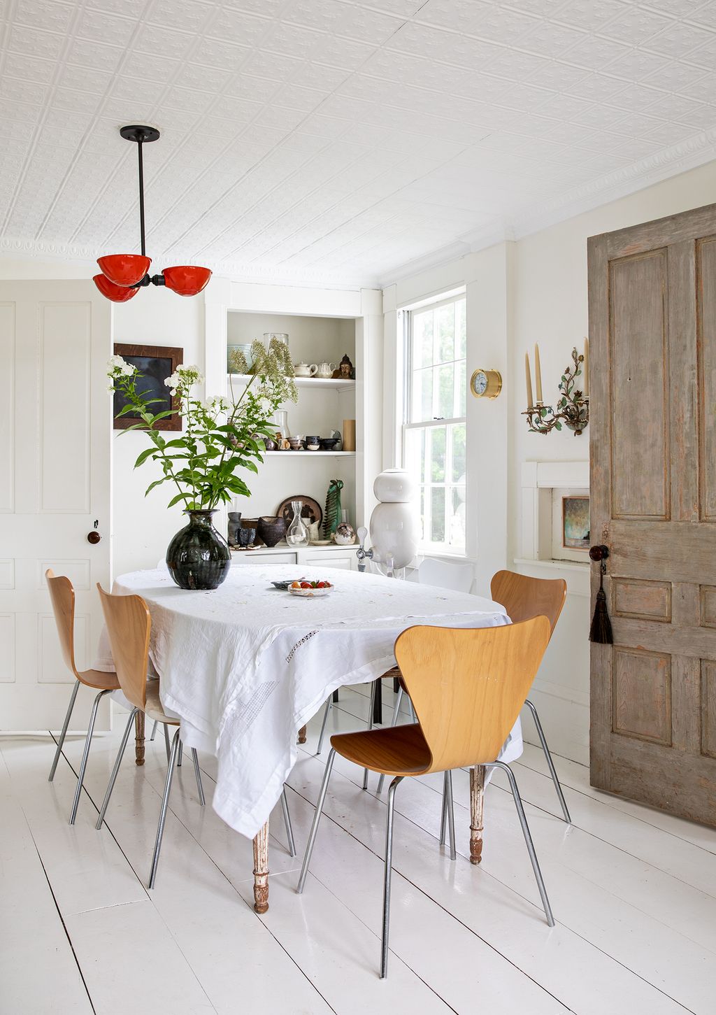 Image may contain Furniture Chair Dining Table Table Room Indoors Dining Room Tabletop and Interior Design