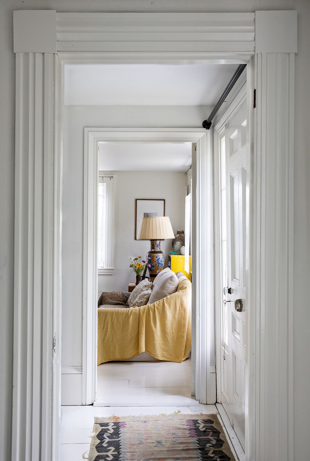 Image may contain Interior Design Indoors Door Floor Furniture Flooring Room and Bedroom