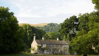 Image may contain Nature Outdoors Grass Plant Building Countryside Rural Hut Cottage Housing and House