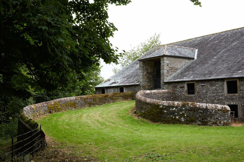 Image may contain Nature Outdoors Cottage Housing House Building Shelter Countryside and Rural