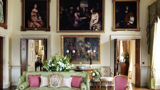 Image may contain Furniture Living Room Room Indoors James Crofts Human Person Interior Design Chair Couch and Art