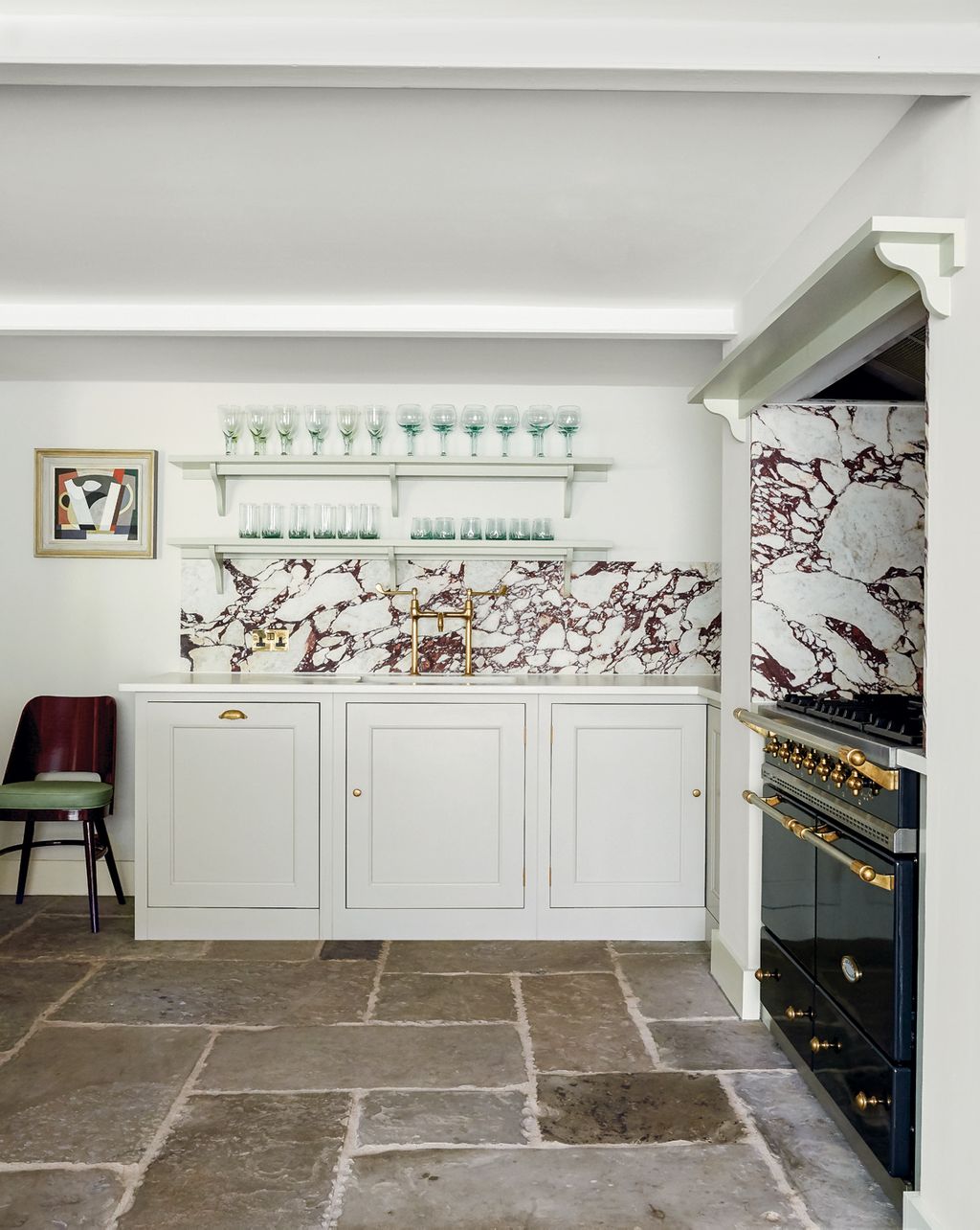 Image may contain Floor Furniture Flooring Indoors Room Shelf and Chair