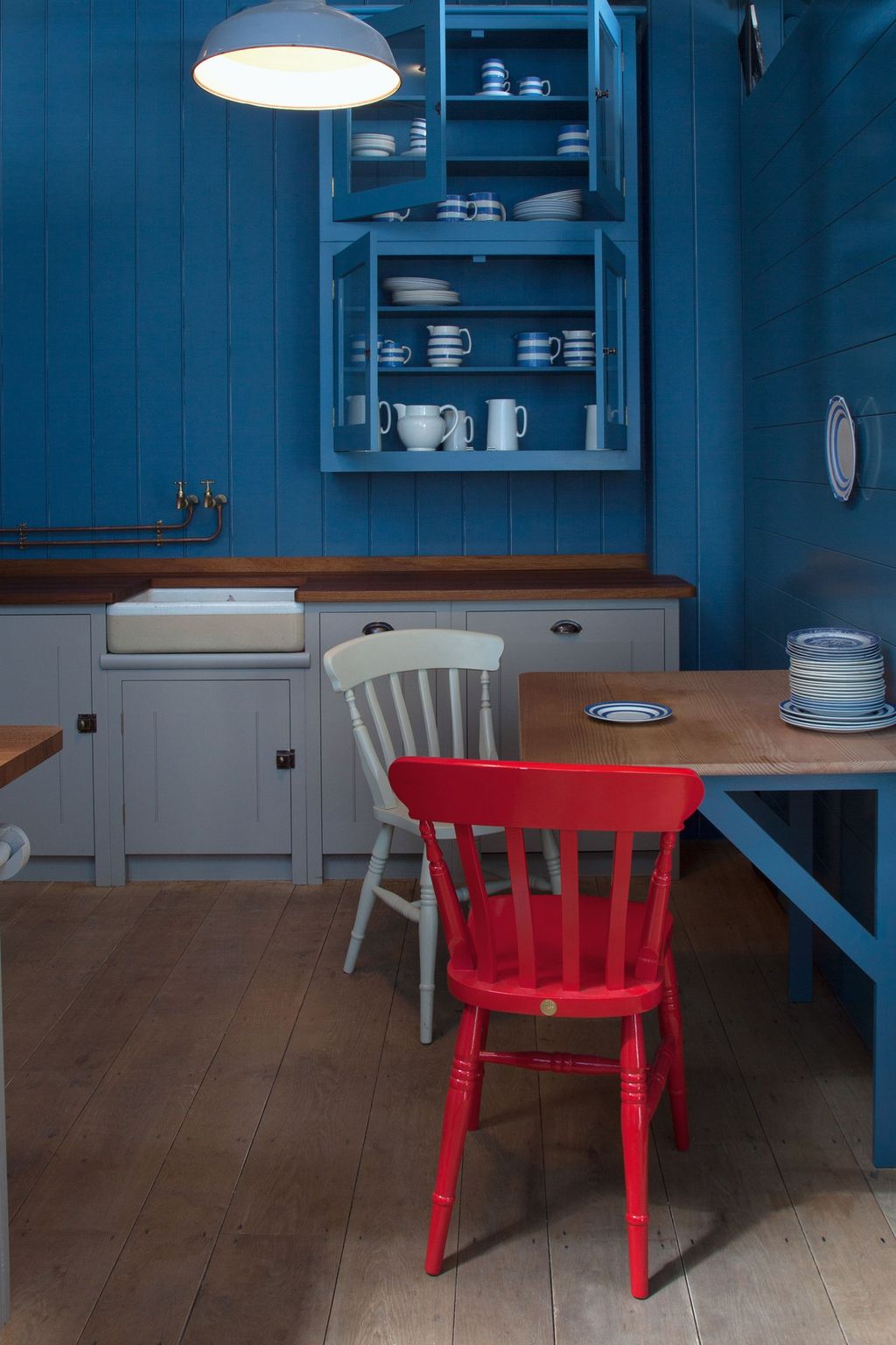 Image may contain Furniture Chair Flooring Wood Interior Design Indoors Hardwood Dining Table Table Floor and Room