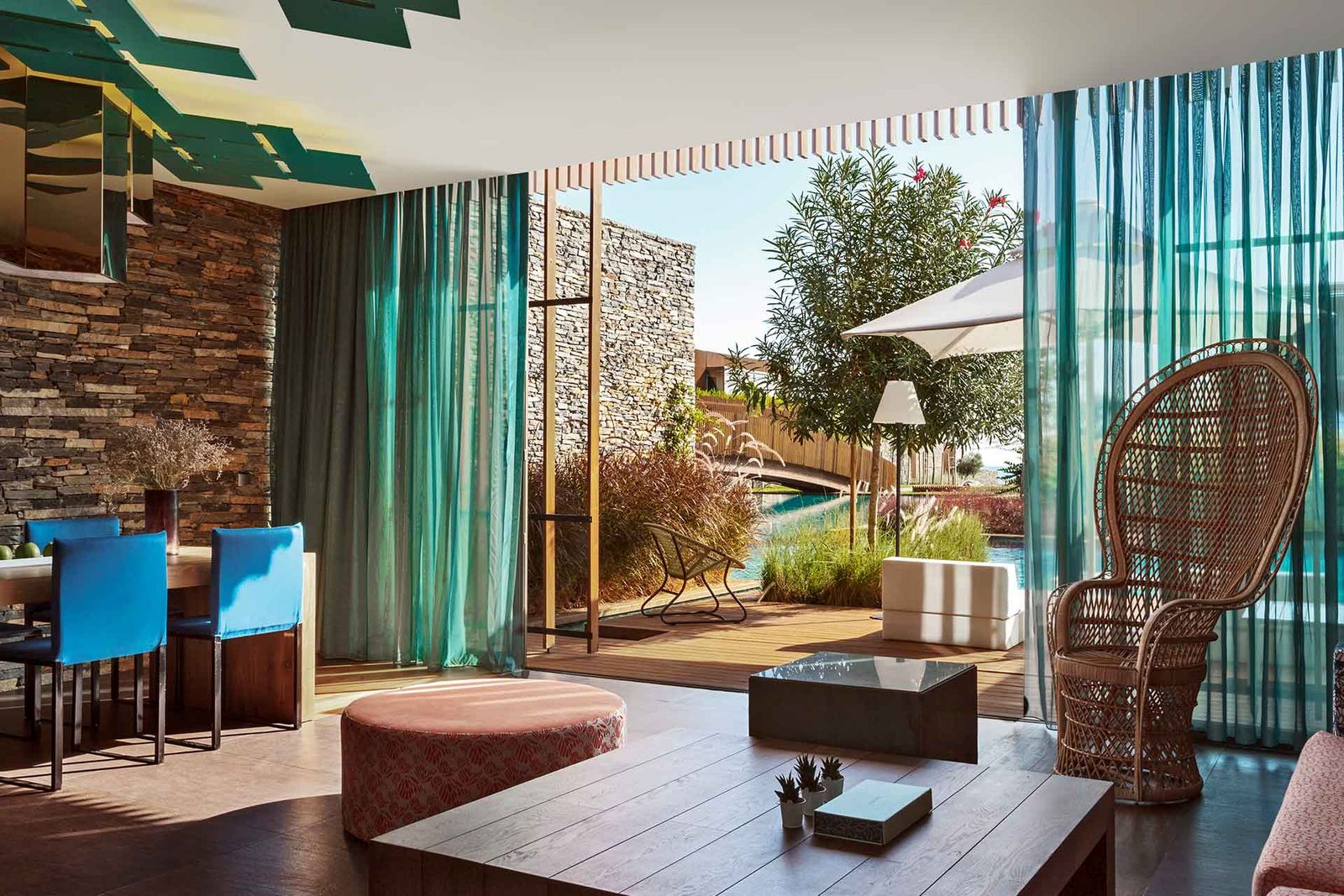 Image may contain Furniture Flooring Chair Floor Wood Interior Design Indoors Table Tabletop Lobby and Room