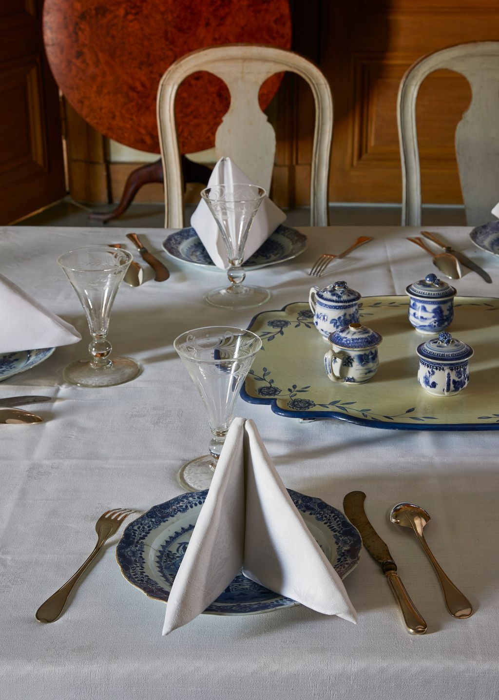 Image may contain Furniture Chair Table and Glass