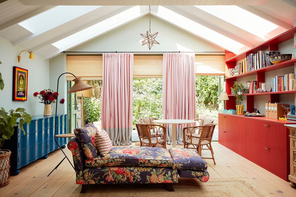 Image may contain Interior Design Indoors Living Room Room Flooring Furniture Floor Cushion Wood and Chair