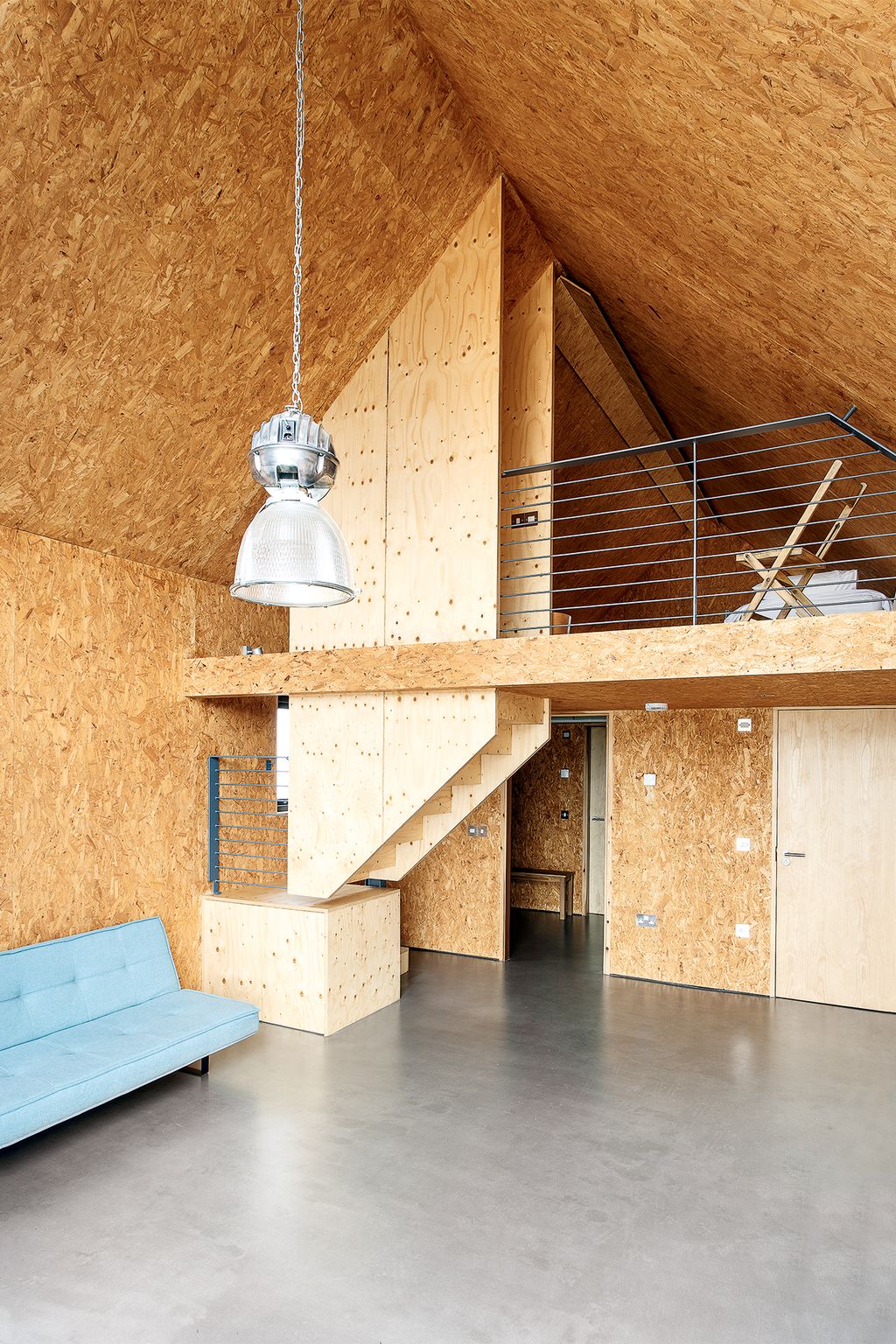 Used as a hangout space for the Weirs children and their friends the bothy has roughly textured chipboard walls...