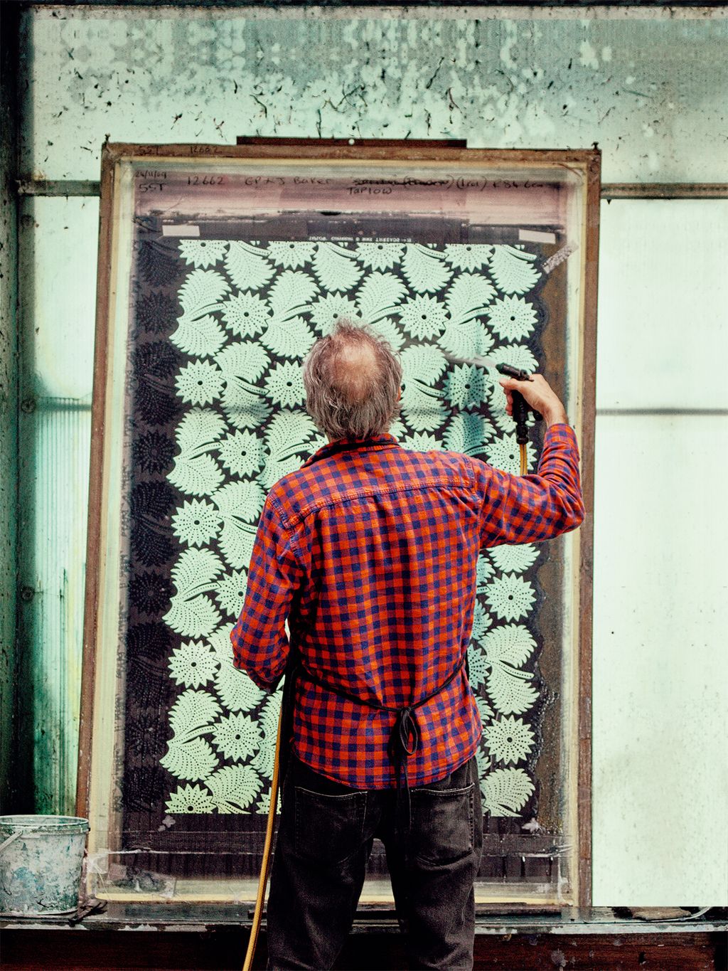 Image may contain Human Person Home Decor Clothing Apparel Sleeve Pants and Door