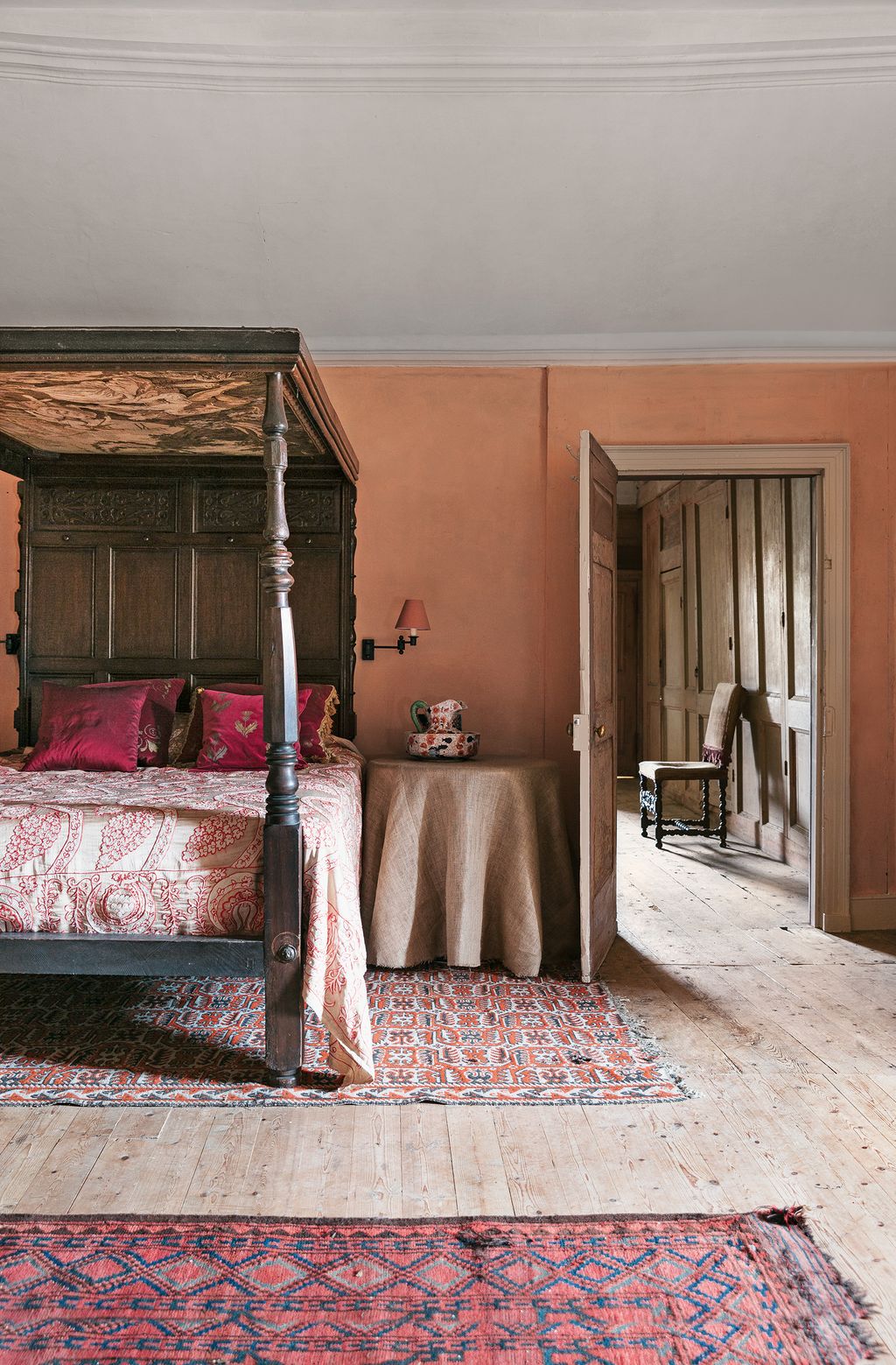 Image may contain Interior Design Indoors Furniture Room Bedroom Bed Home Decor and Flooring