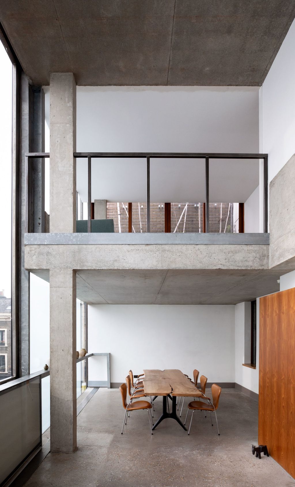 Image may contain Furniture Chair Housing Building Indoors Loft Interior Design Wood Room and Bedroom