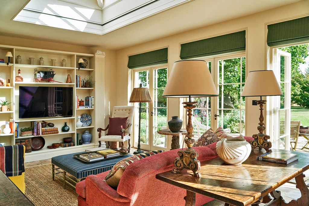 Image may contain Living Room Room Indoors Furniture Interior Design Couch Lamp and Table Lamp