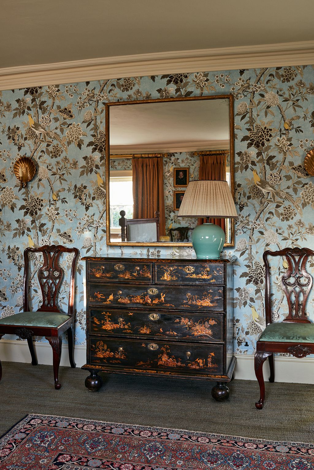 Image may contain Furniture Chair Cabinet Wood Hardwood and Rug