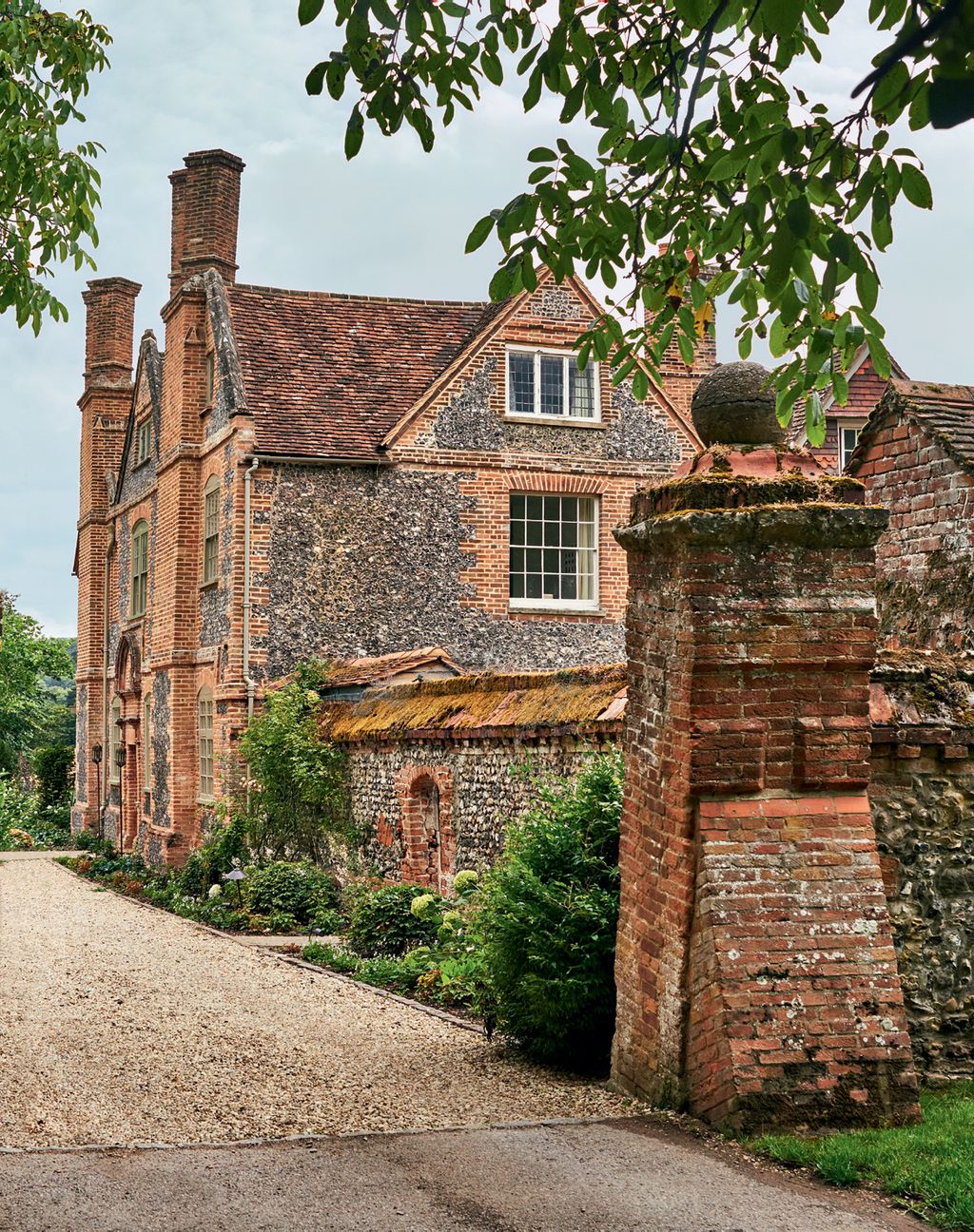Image may contain Path Walkway Building Roof Architecture Castle Tree and Plant