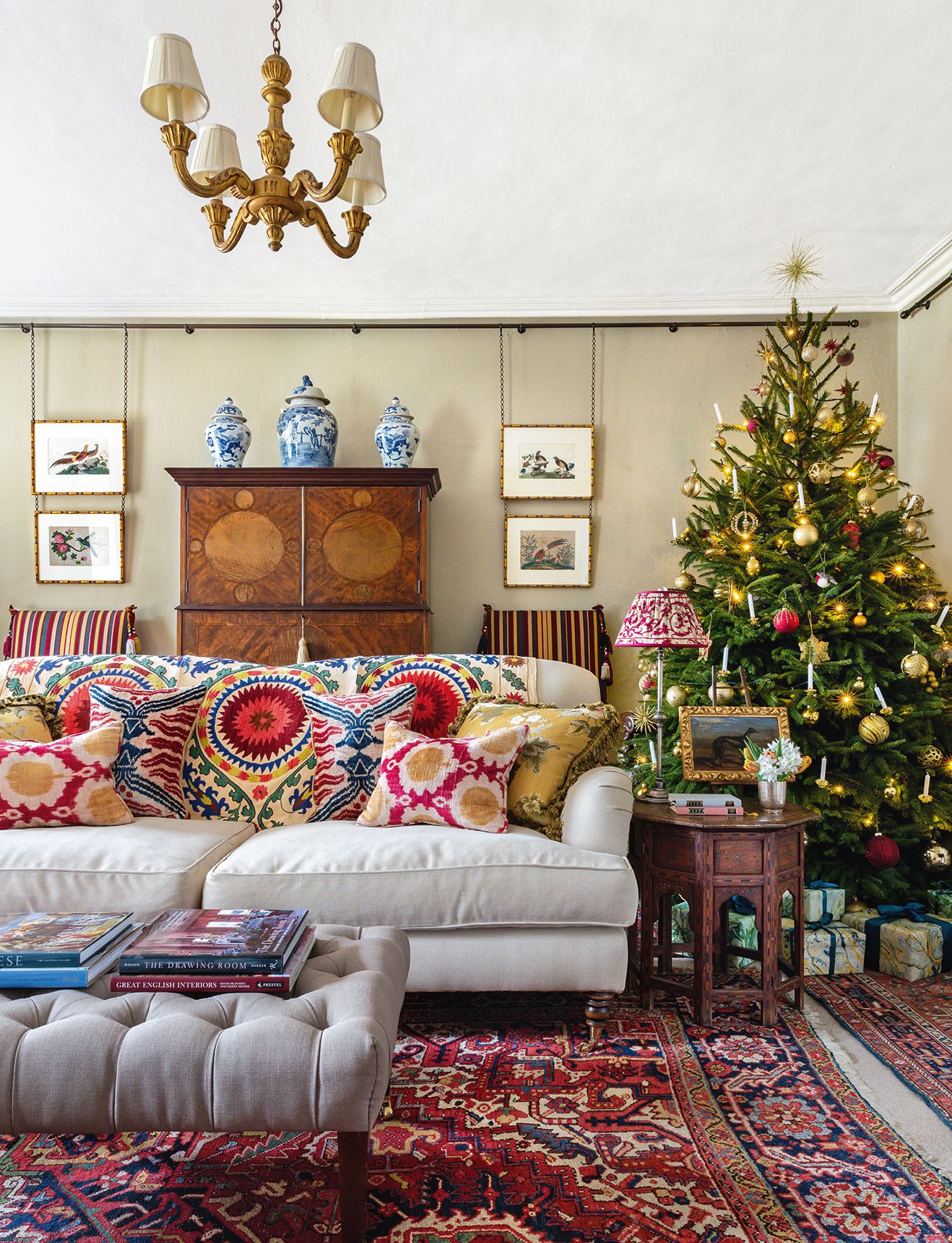 Image may contain Living Room Room Indoors Furniture Couch Tree Plant Cushion Rug Interior Design and Table