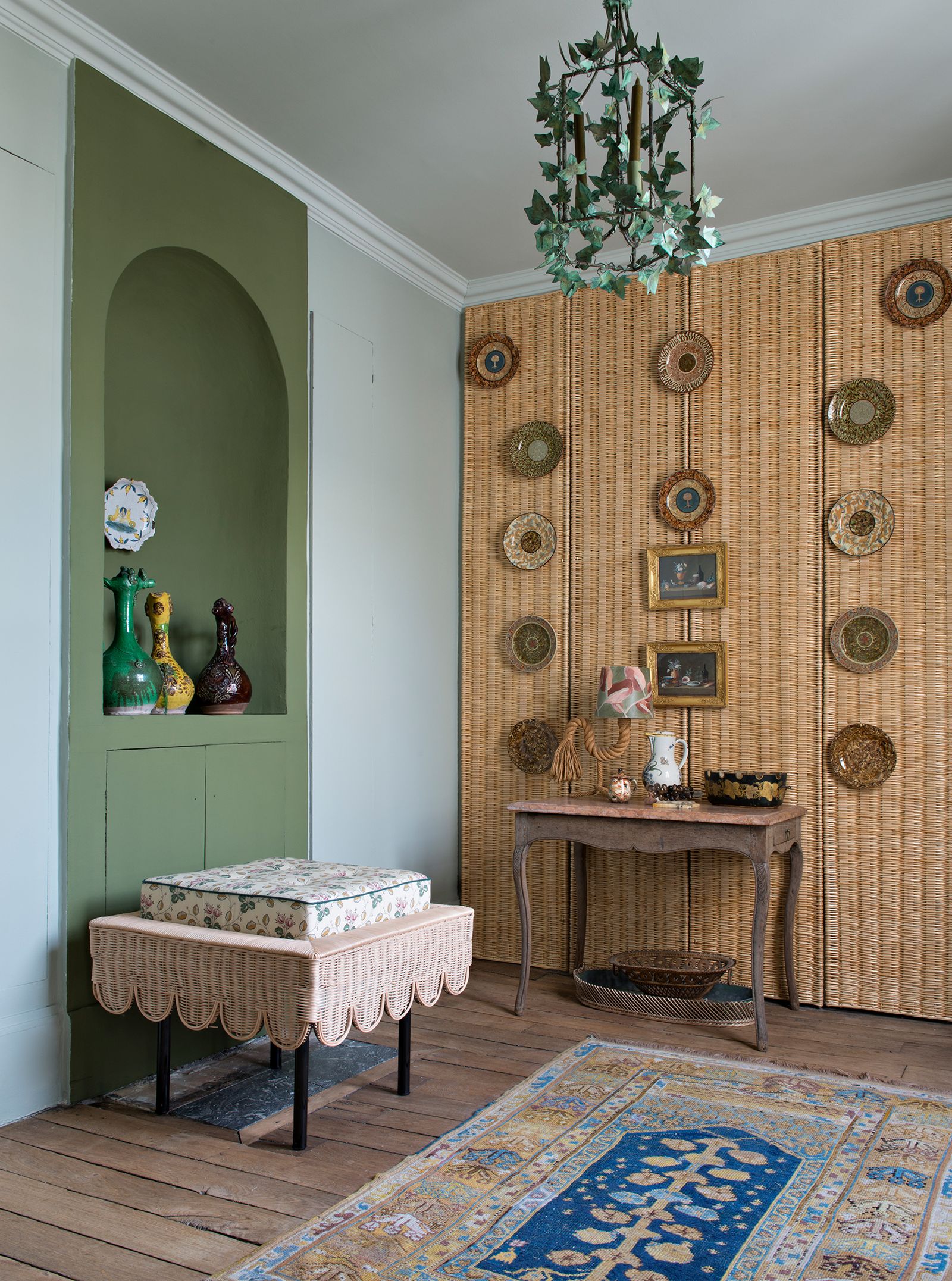 Image may contain Furniture Rug Home Decor Living Room Room and Indoors