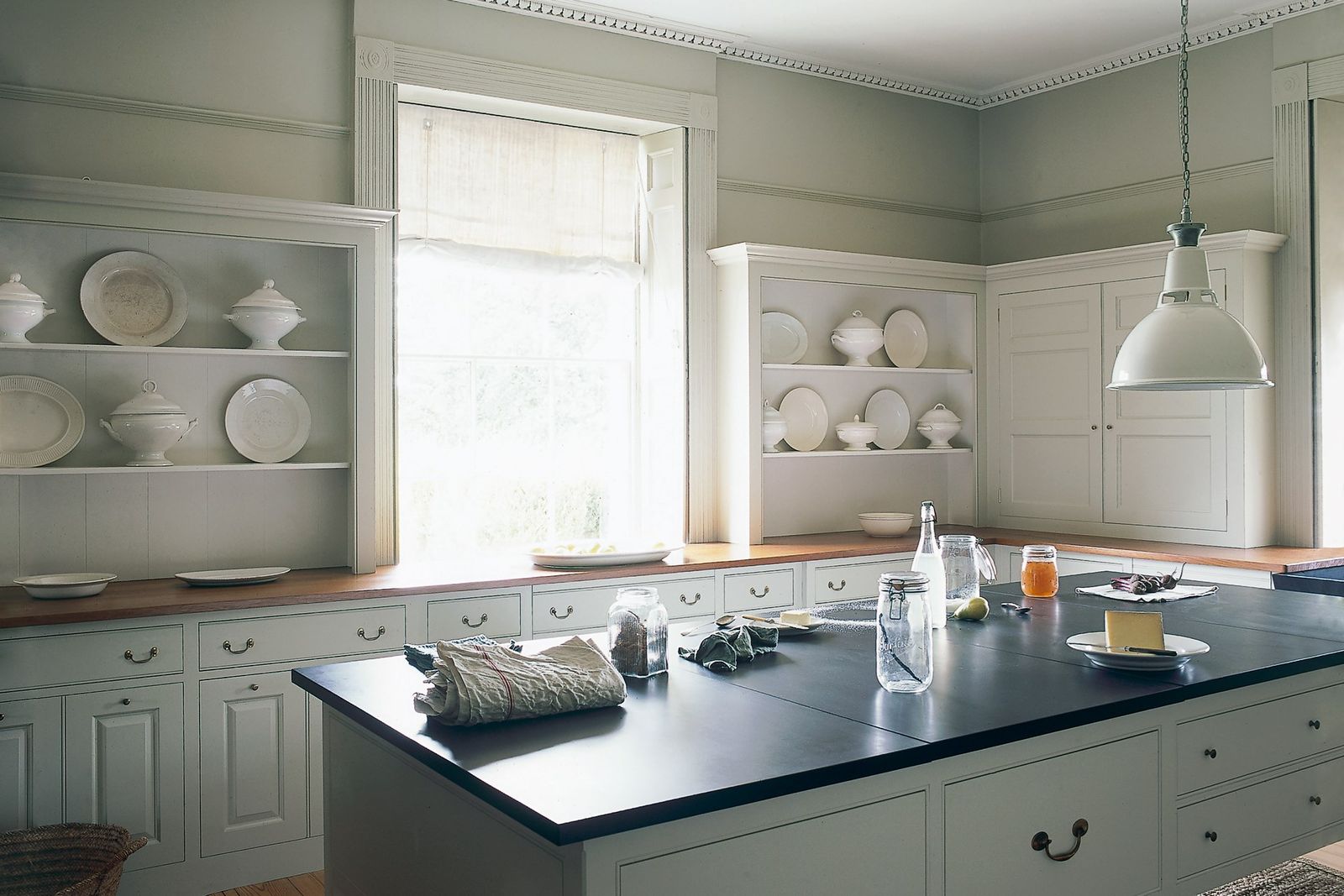 Image may contain Indoors Room Kitchen Kitchen Island and Interior Design