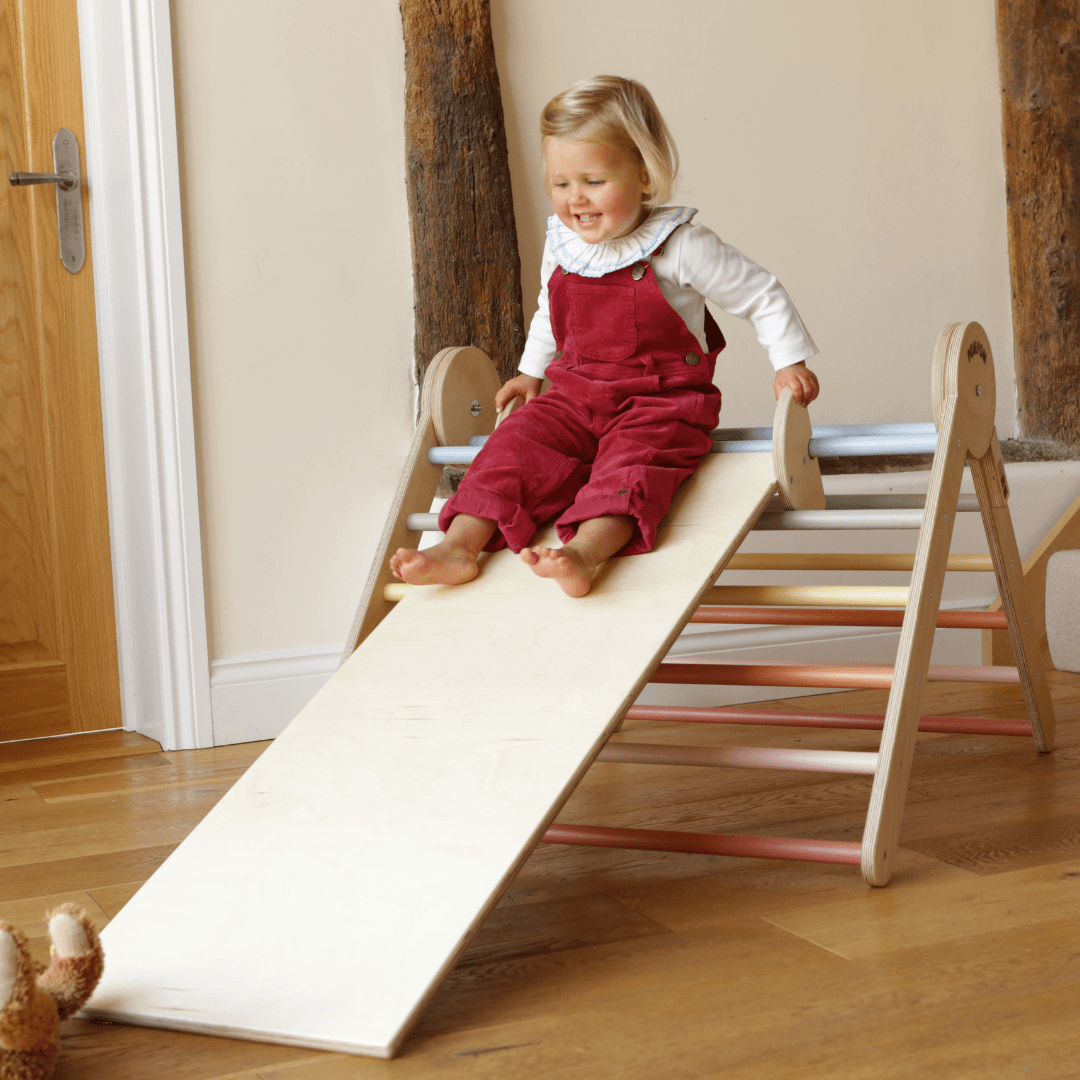 Image may contain Wood Human Person Toy Slide Hardwood Plywood and Flooring