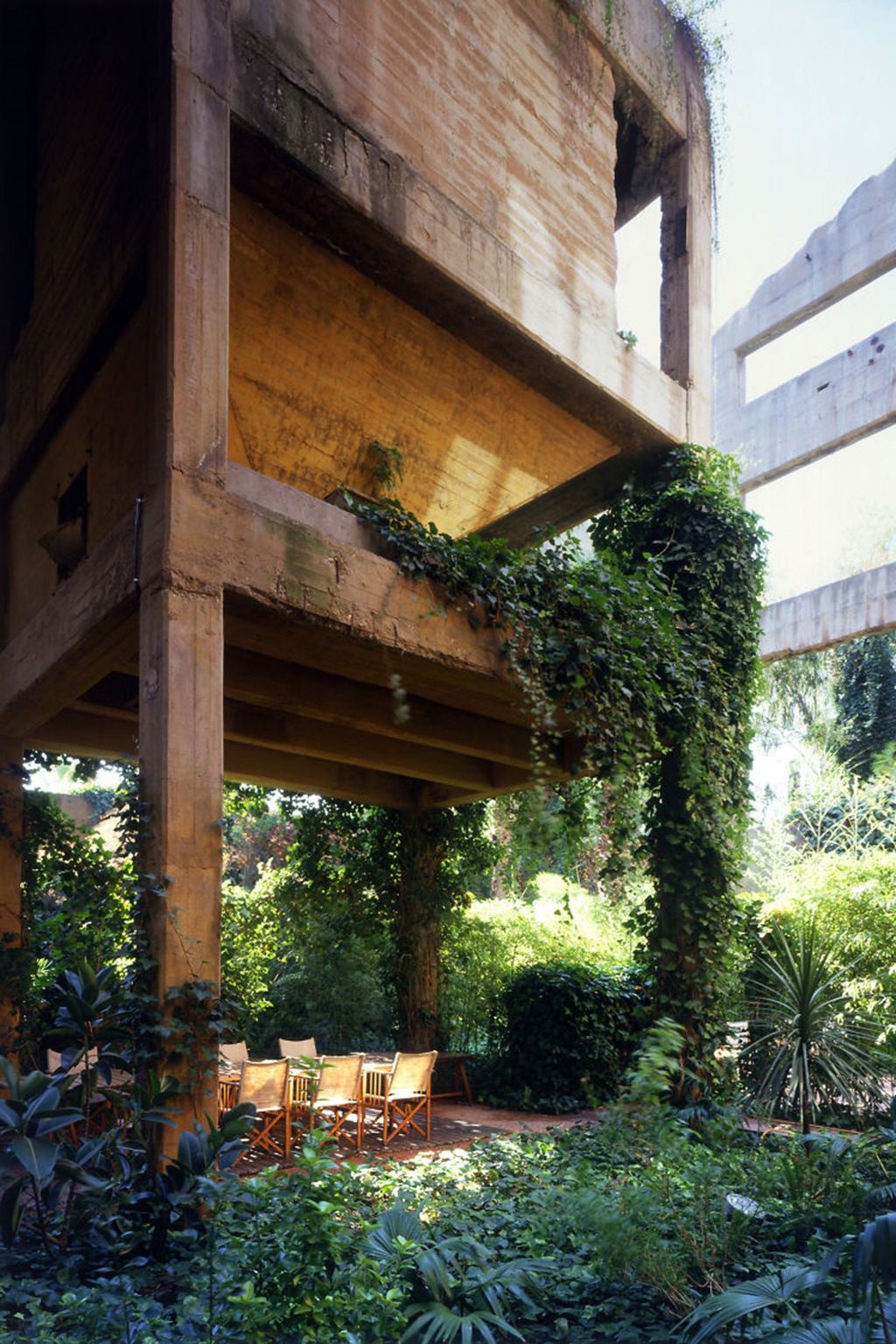 Image may contain Porch Patio Outdoors Pergola Garden Furniture Chair and Arbour