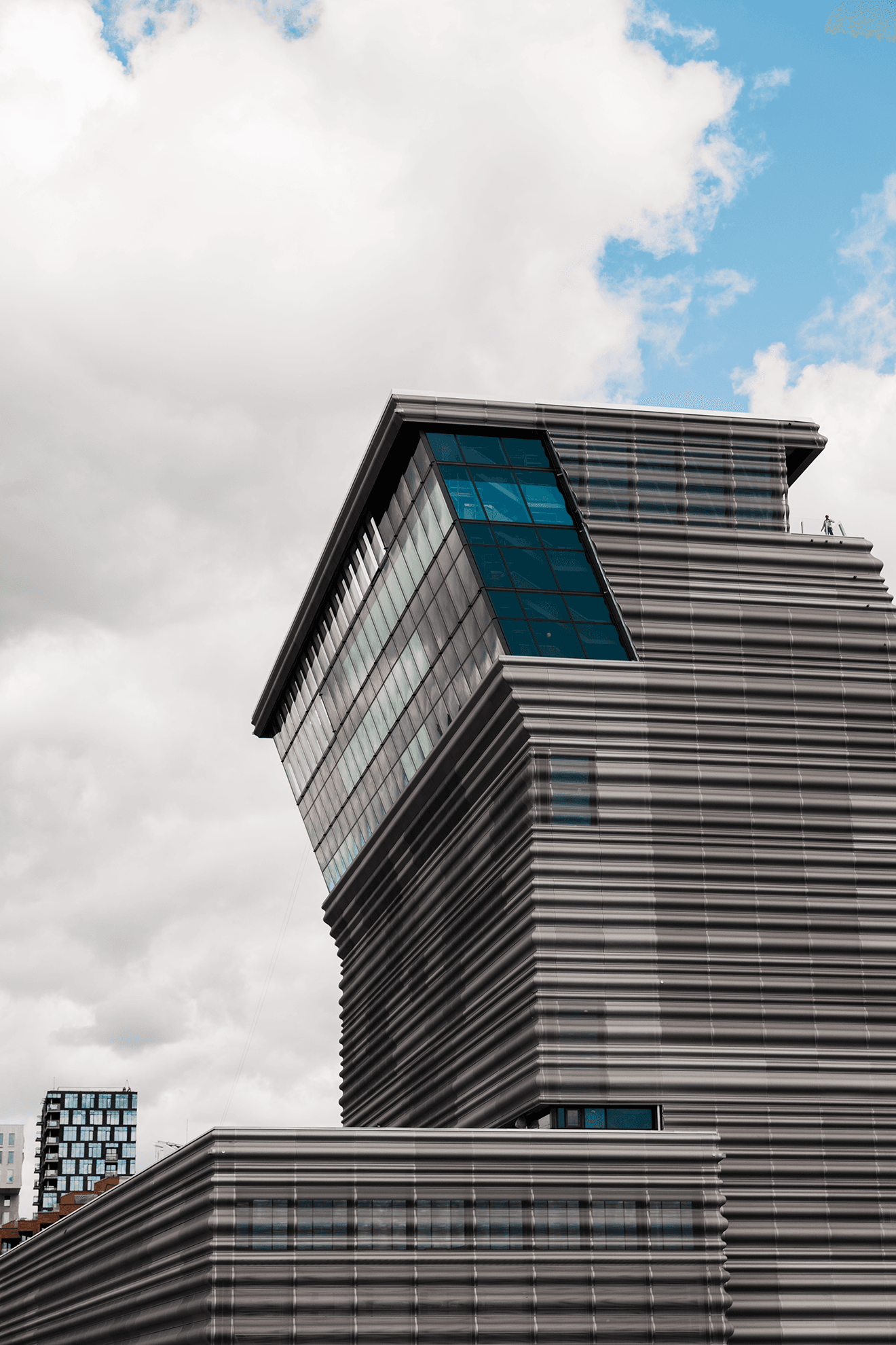 Image may contain Building Office Building City Town High Rise Urban Housing Condo and Architecture