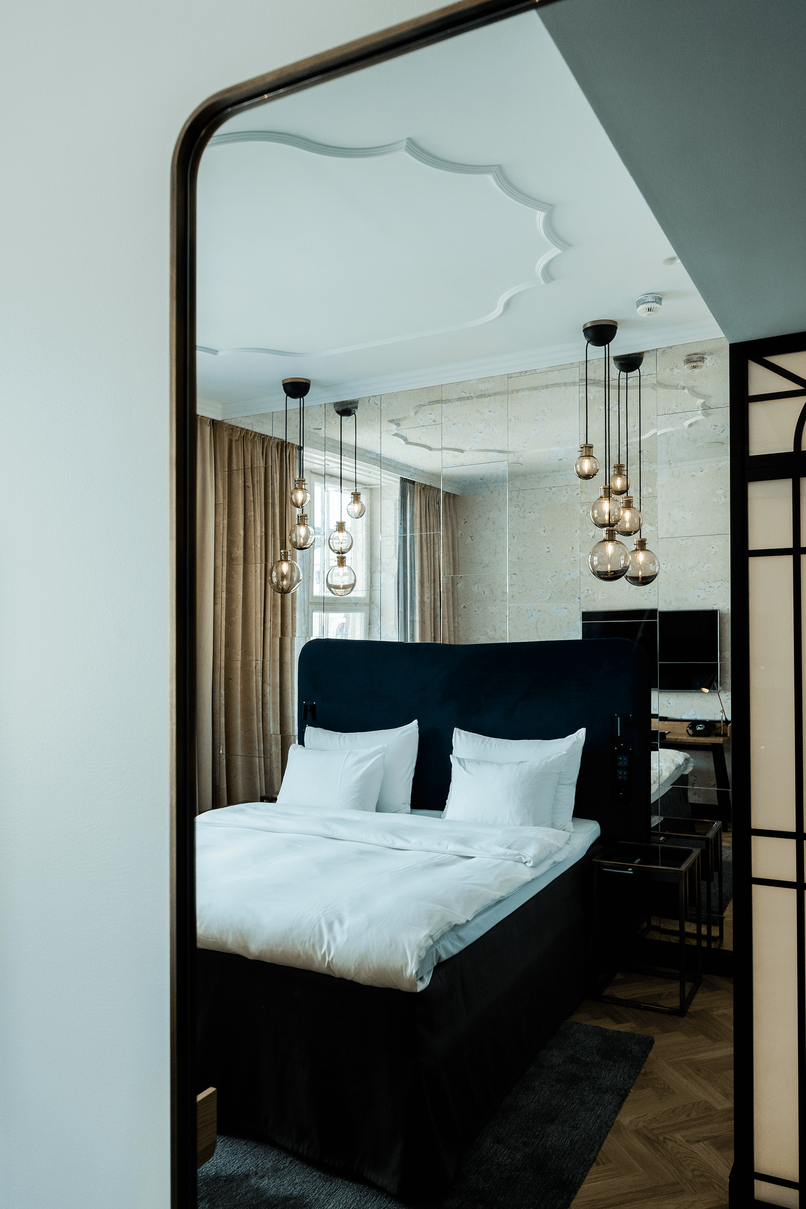 Image may contain Indoors Room Bedroom Furniture Bed Interior Design Building and Housing