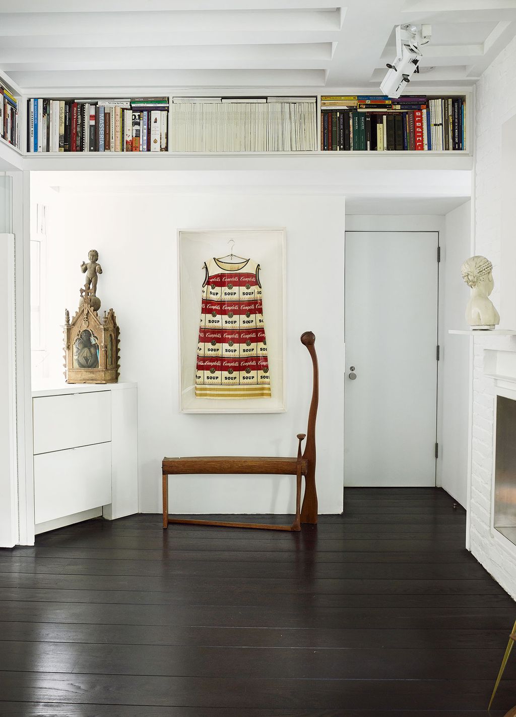 Image may contain Flooring Wood Interior Design Indoors Corner Furniture Shelf Floor Hardwood and Room