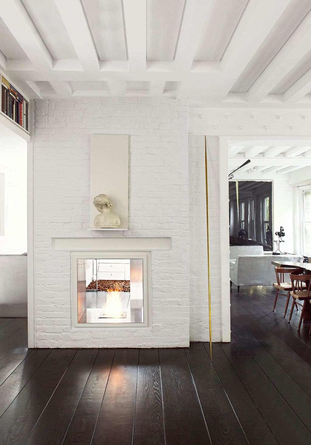 ‘She is very uncomfortable being looked at says Ghiora of the marble bust above his fireplace the original hearth of...