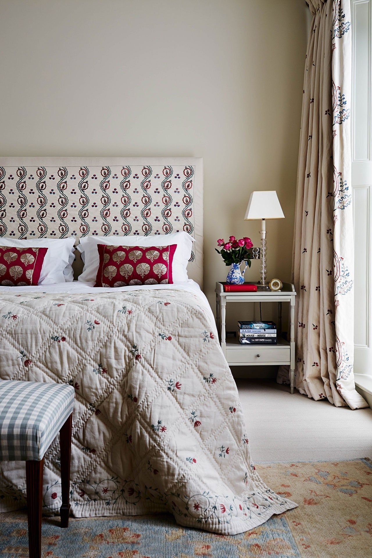 Image may contain Interior Design Indoors Room Bedroom Furniture Bed Home Decor Cushion and Living Room