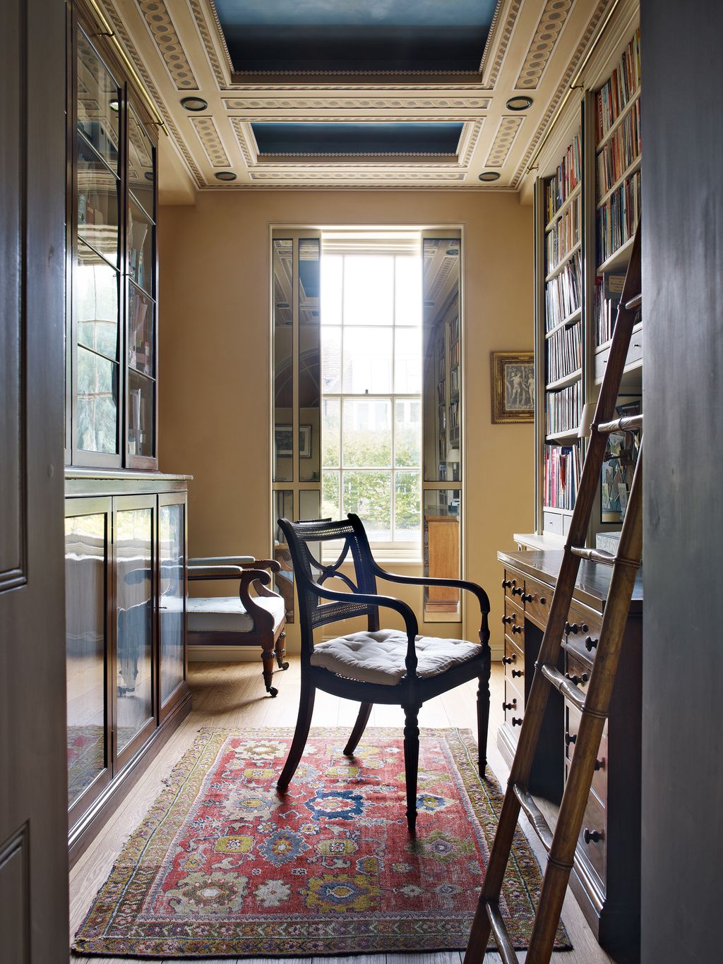 Image may contain Furniture Chair Rug Indoors Interior Design and Room