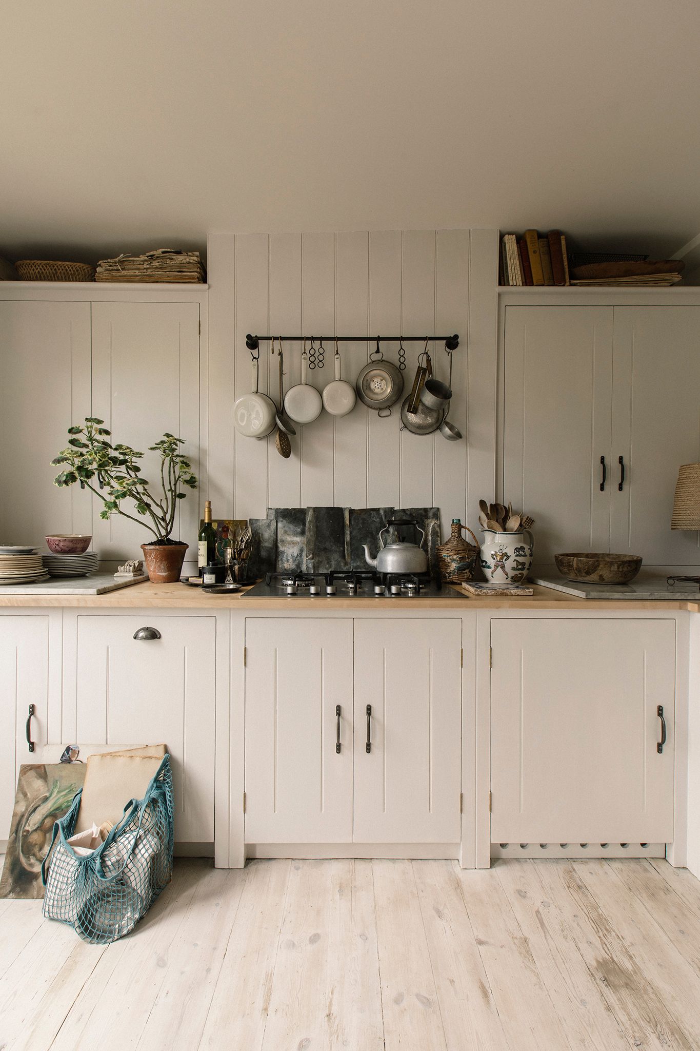 Image may contain Room Indoors Furniture Kitchen and Pottery