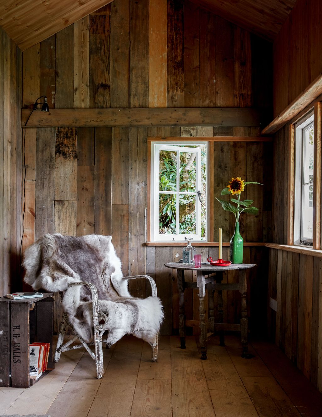 Image may contain Wood Hardwood Furniture Living Room Room Indoors Flooring Floor and Plywood