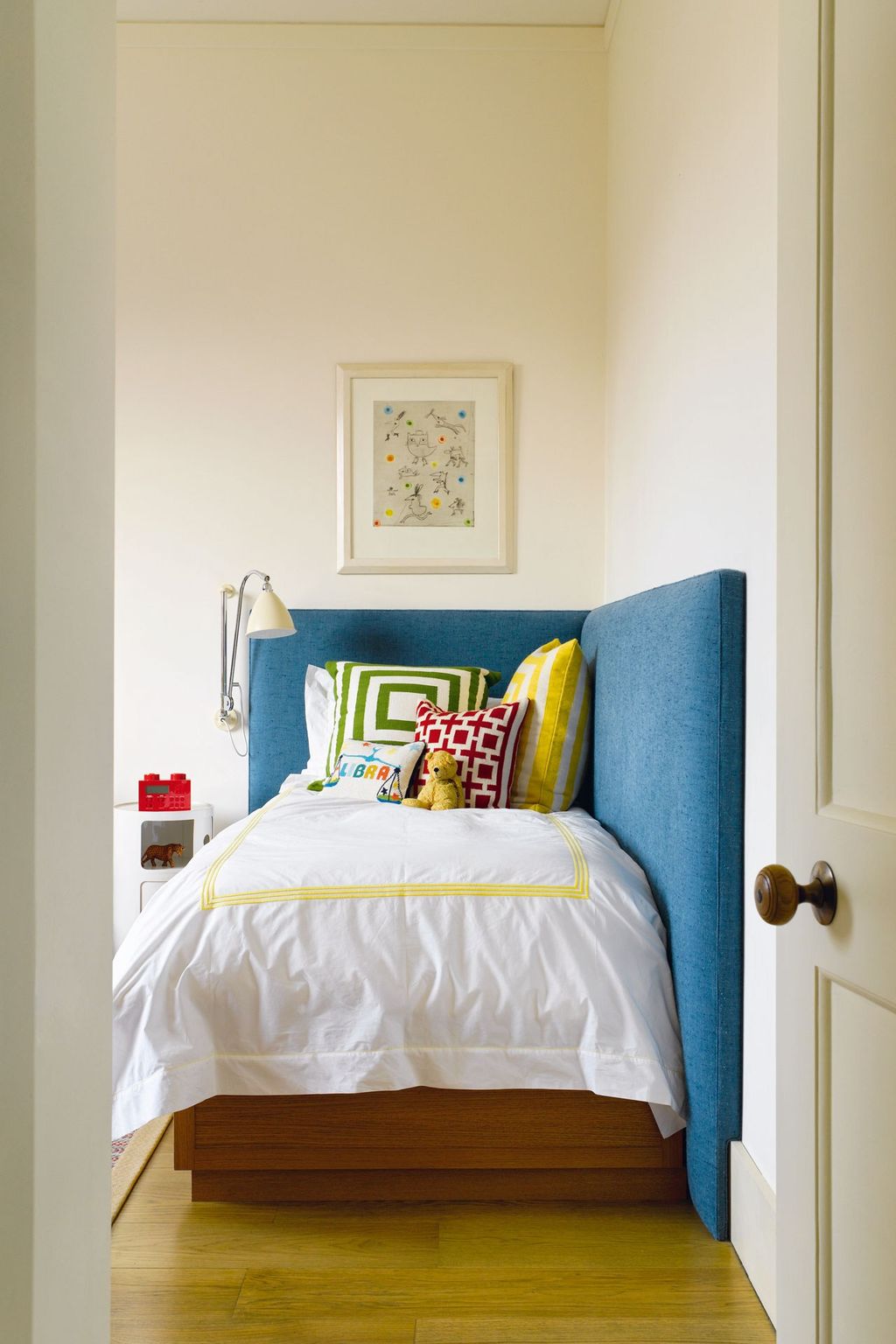 Image may contain Indoors Room Bedroom Furniture Bed Dorm Room and Corner