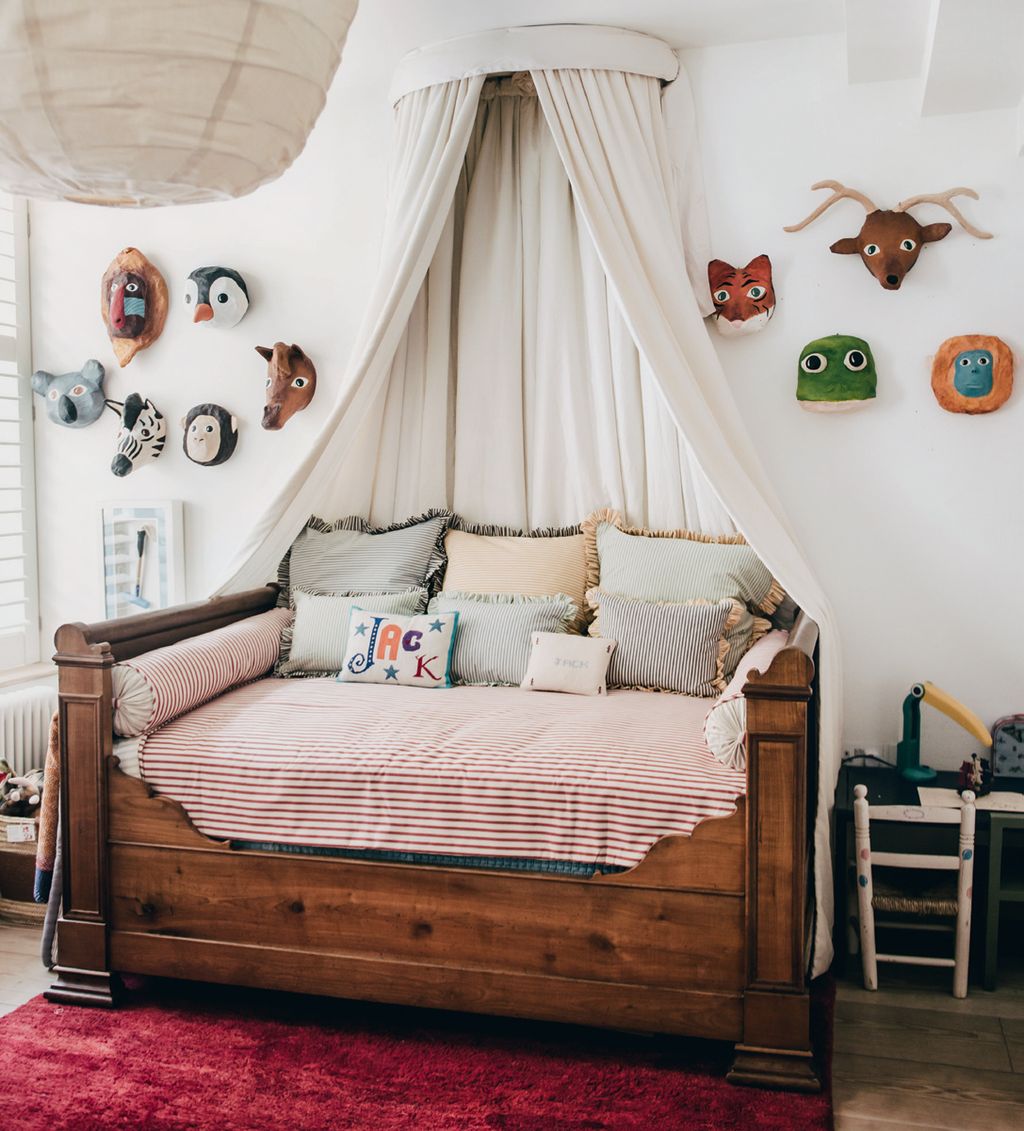 Image may contain Indoors Room Bedroom Dorm Room Furniture Bed Cushion and Living Room