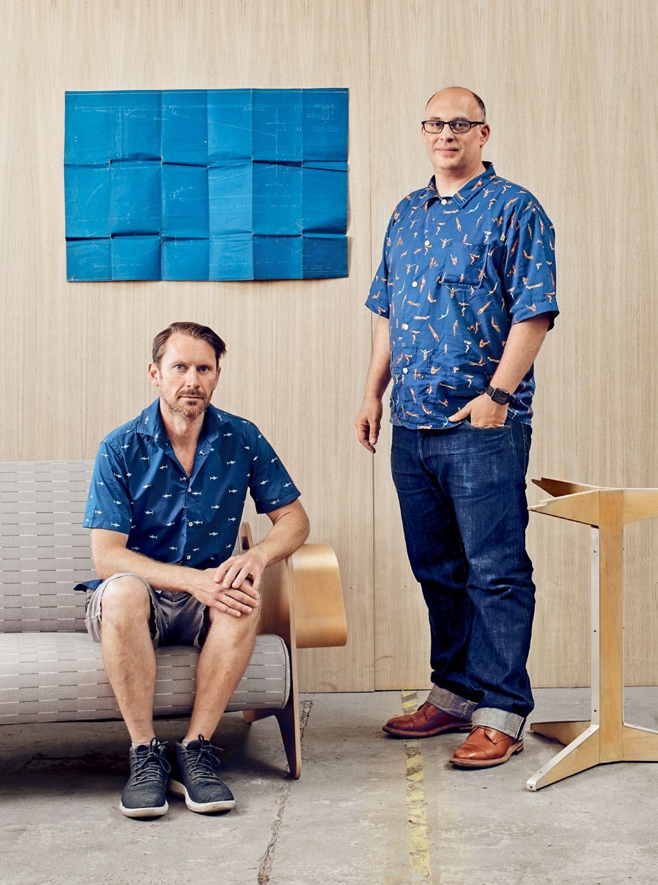 Image may contain Footwear Clothing Shoe Apparel Human Person Wood Pants Sitting Plywood Furniture and Denim