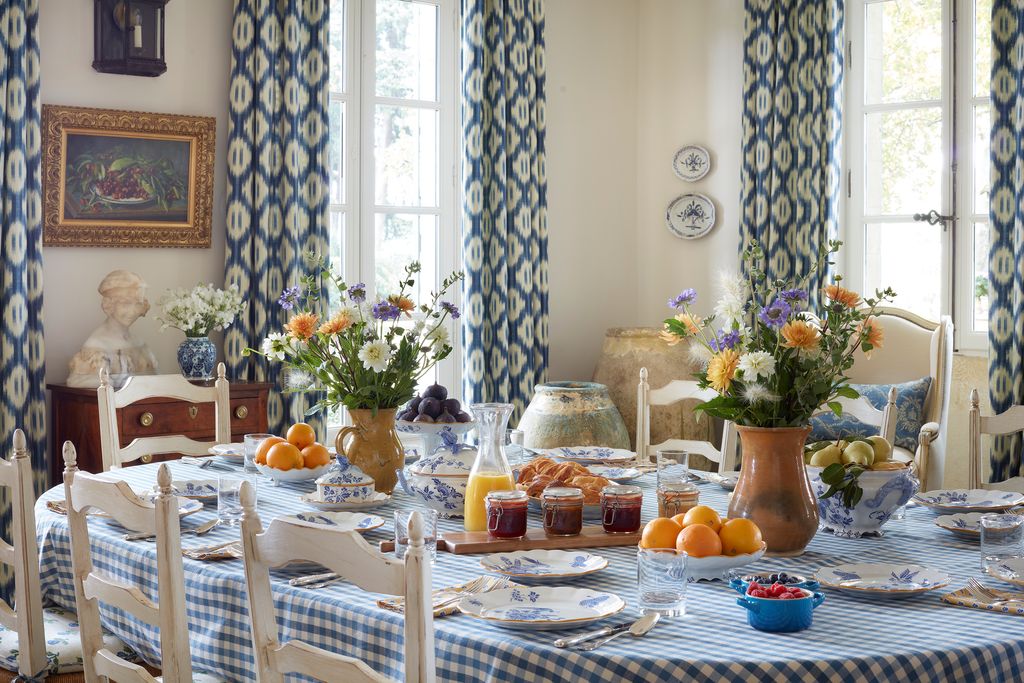 Image may contain Tablecloth Home Decor Plant Furniture Table Dining Table Flower Blossom Pottery and Linen