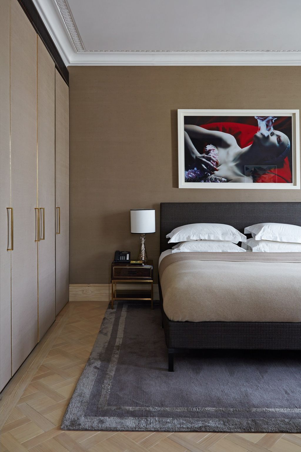 Image may contain Room Bedroom Indoors Furniture Bed Rug Interior Design and Flooring