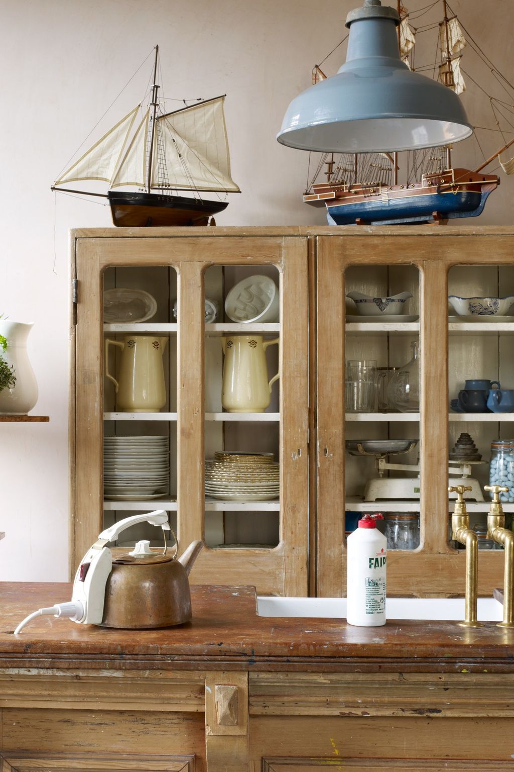 Image may contain Furniture Cabinet China Cabinet Shelf Home Decor Sideboard Cupboard Closet and Wood