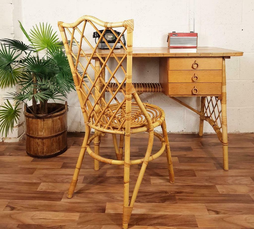 Image may contain Furniture Table Desk Chair Wood and Electronics