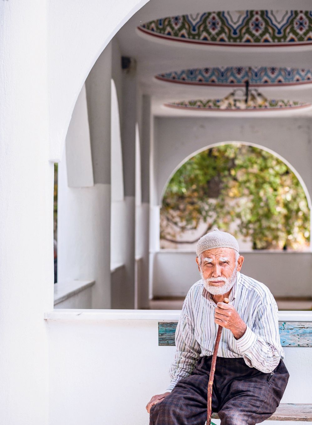 A local man outside the mosque in Bezirgan a nearby village.