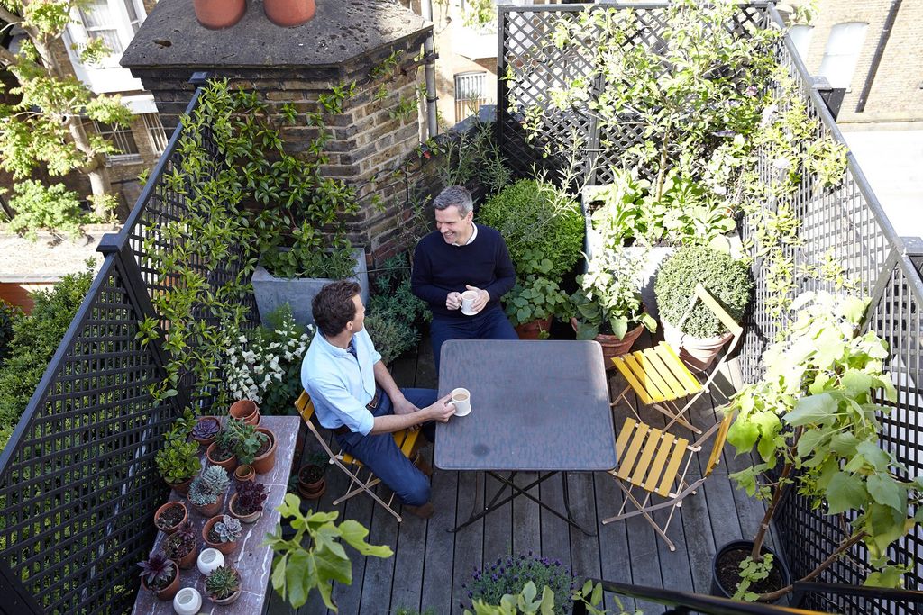 Image may contain Human Person Outdoors Garden Arbour Furniture Chair and Patio