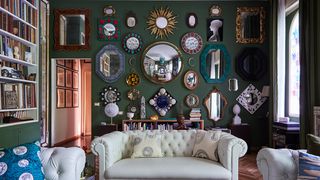 Image may contain Living Room Indoors Room Couch Furniture Interior Design Cushion and Pillow