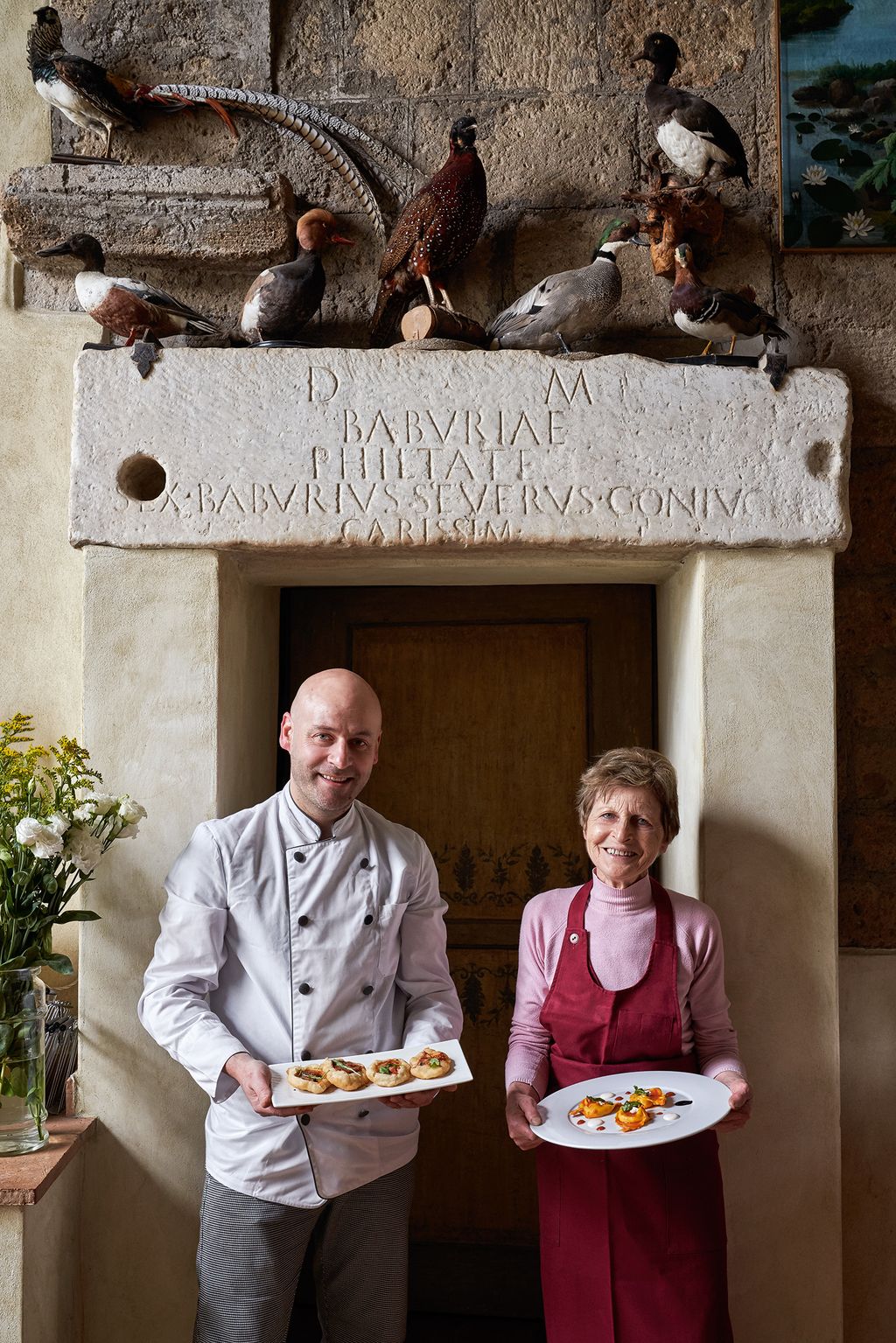 Image may contain Human Person Animal Bird Food and Meal