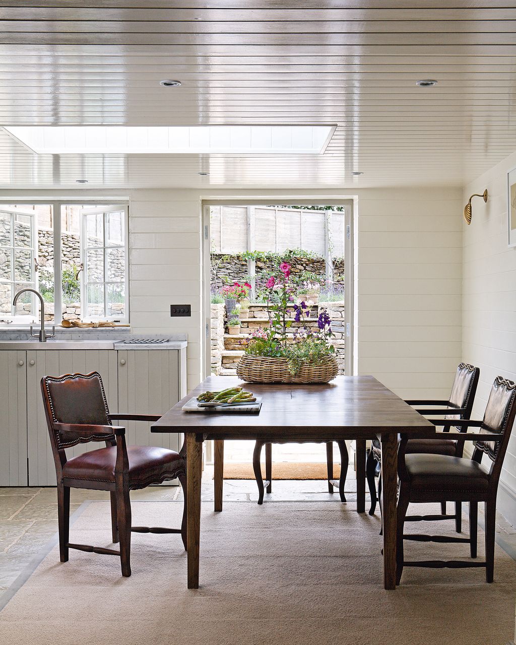 A modern extension was built to house the New Englandstyle kitchen which incorporates a Victorian skylight and...